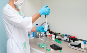 a nurse makes an analysis at a clinic laboratory