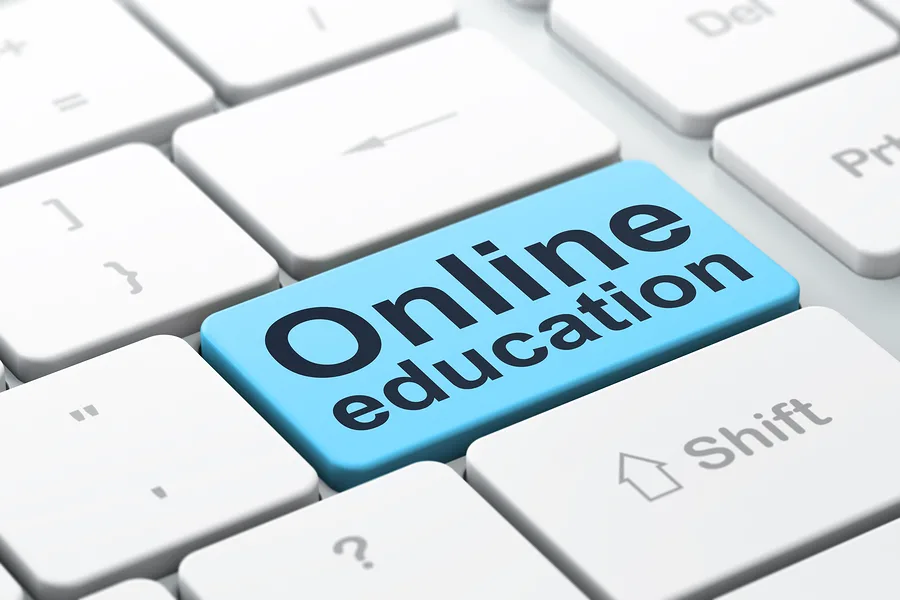 Education concept: Online Education on computer keyboard backgro