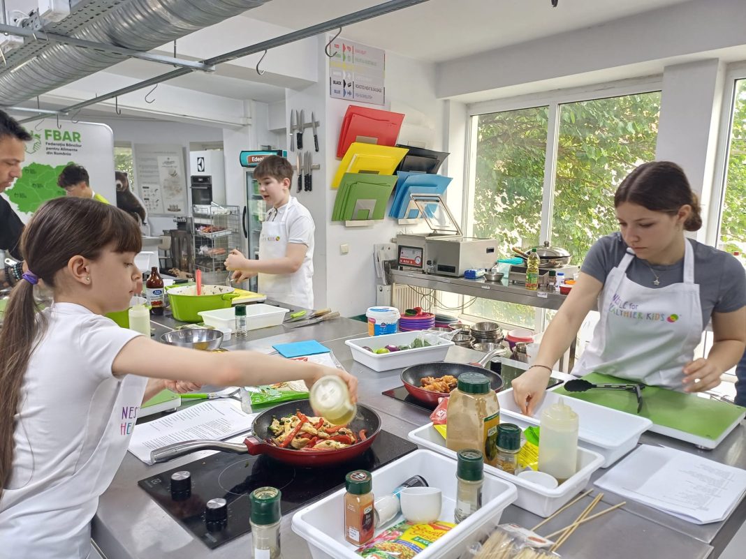 20240523 Nestle risipa alimentara foto copii gatesc